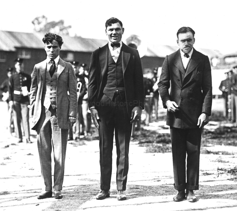 Charlie Chaplin 1919 With Boxing Champion Jack Dempsey and Douglas Fairbanks at Clune Studio WM.jpg